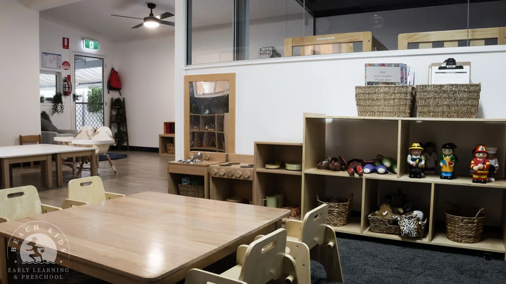 The art and studio space at Beach Kids Cabarita with timber tables and baskets